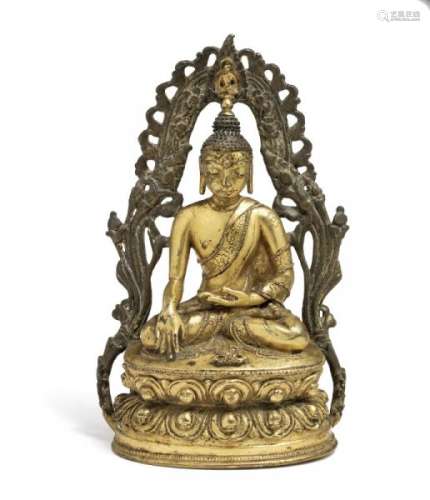 A Tibetan gilt bronze figure of Akshobhya. 16th-17th century. Weight 755 g. H. 16.5 cm. -