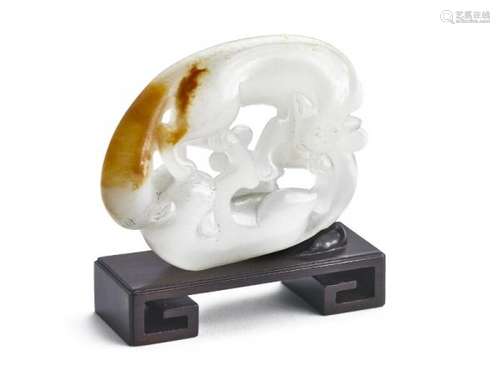 A Chinese jade pendant with a yellow splash and carved in the shape of feline animals [...]