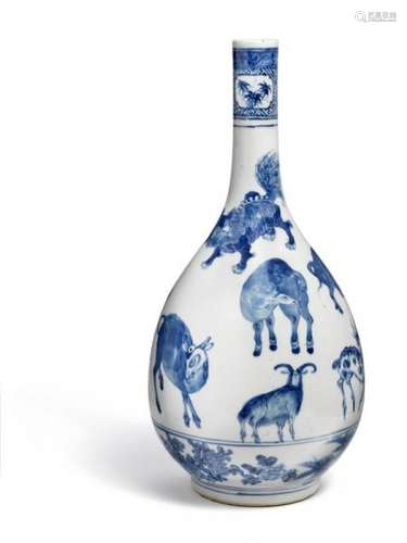 A Chinese pear shaped porcelain vase decorated in underglaze blue with animals. [...]