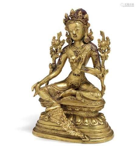 A Chinese gilt bronze figure of Green Tara. 18th century. Weight 1924 g. H. 18.5 cm.  -