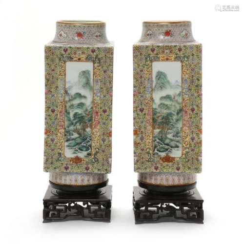 A pair of Chinese famille rose square porcelain Cong vases. Marked Made during the [...]