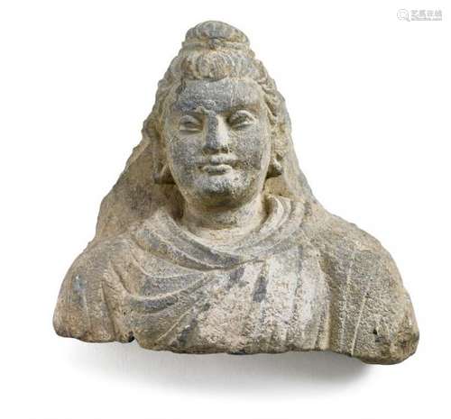 A Gandhara schist relief fragment of Buddha. 3rd-4th century. H. 14 cm.  -