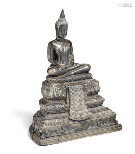 A silvered metal figure of Buddha Shakyamuni. Weight 1600 g. H. 20.5 cm.  -