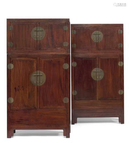 A pair of large Chinese hardwood cupboards with upper cabinet and bronze fittings. [...]