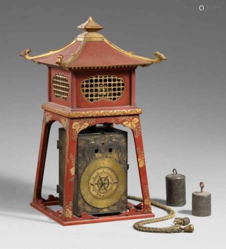 An iron and brass lantern clock (yagura-dokei). 19th centuryWith a deep bell over two [...]