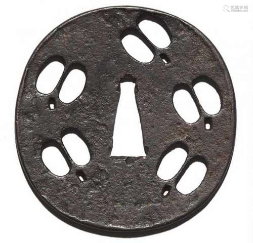 An iron ko-katchushi tsuba. 16th centuryA nearly round shape with a slightly [...]