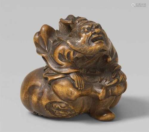 A boxwood and ivory netsuke of Shôki with oni. 19th centuryThe demon queller sits on [...]