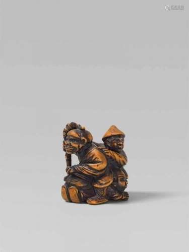 A boxwood netsuke of Kanshin. 19th centuryAvoiding trouble by crawling under his [...]