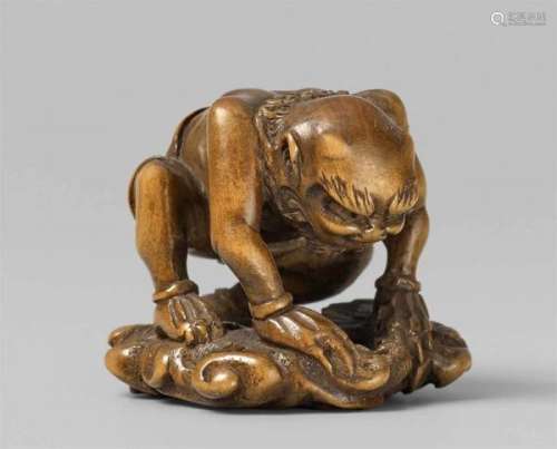 A boxwood netsuke of Fûten. Early 19th centuryDressed in a tiger skin and peeping [...]