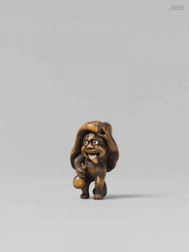 A boxwood netsuke of a drunk tanuki. Late 19th centuryWith a grimacing face, looking [...]