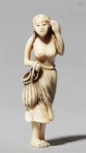 An ivory netsuke of a fishergirl. Early 19th centuryStanding, turning slightly to the [...]