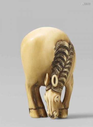 An ivory netsuke of a grazing horse. 19th centuryStanding with hooves placed closed [...]