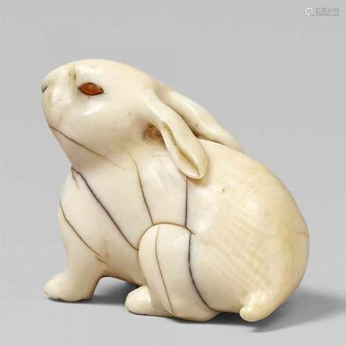 An ivory netsuke of a hare. Early 19th centuryRaising its head with its long ears [...]