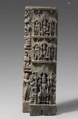 A Central Indian dark grey stone pilaster. 11th centuryCarved in three registers at [...]