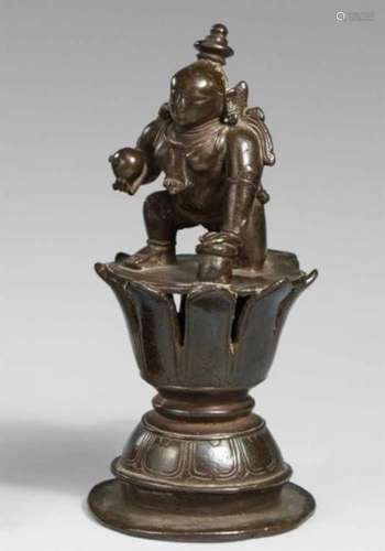 A South Indian copper alloy figure of Bala-Krishna. 14th/15th centuryKneeling and [...]