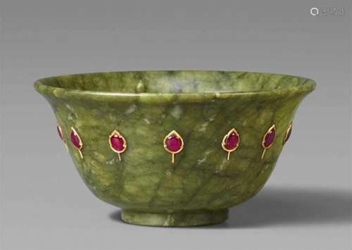 A small North Indian Mughal style moss-green nephrite bowlRising from a small foot [...]