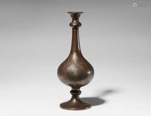 A Mughal bronze rosewater sprinkler. 19th centuryThe globular body, splayed foot and [...]