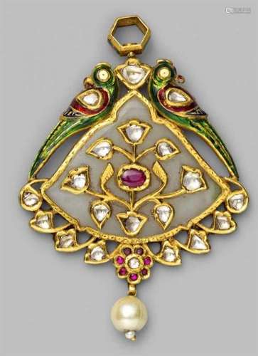 A North Indian white jade pendant set with foil-backed rubies and diamonds in gold [...]