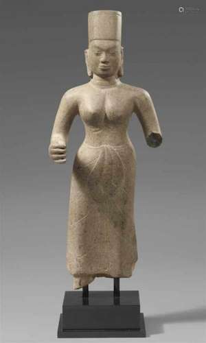 A Pre-Angkor sandstone figure of a devi. Cambodia/Mekong delta. 7th centuryStanding [...]