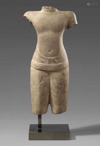 A Khmer male sandstone torso. Cambodia. Baphuon style. 11th centuryWith a slender [...]