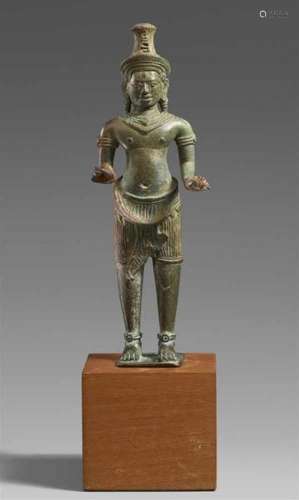 A Khmer bronze figure of a standing Shiva. Cambodia. Bayon style. 13th [...]