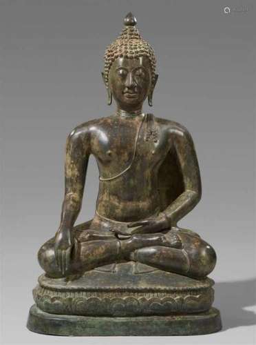 A very fine Northern Thai bronze figure of Buddha Maravijaya. 15th centurySeated in [...]