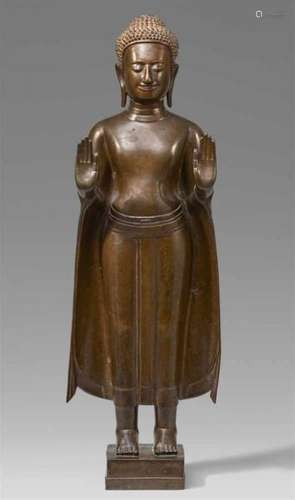 An U-Thong style bronze figure of a Buddha. Thailand. 17th centuryStanding on a small [...]