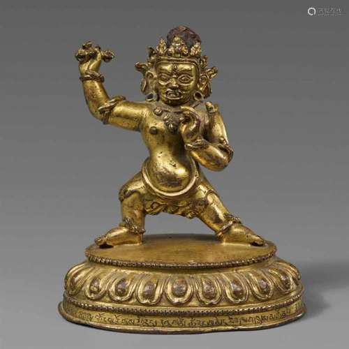 A Tibetan gilt bronze figure of Vajrapani. 15th centuryThe Holder of the Thunderbolt [...]