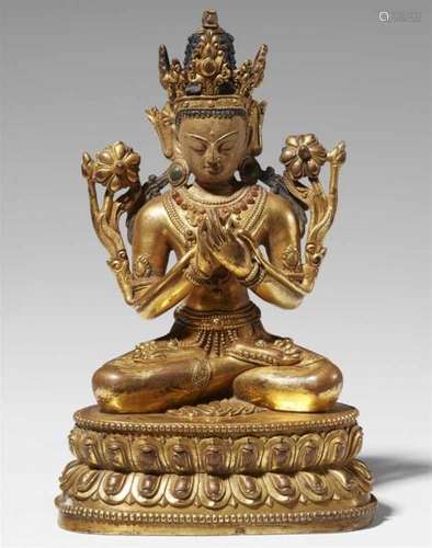 A Tibetan gilt bronze figure of Maitreya. 17th centurySeated in dhyanasana on a [...]