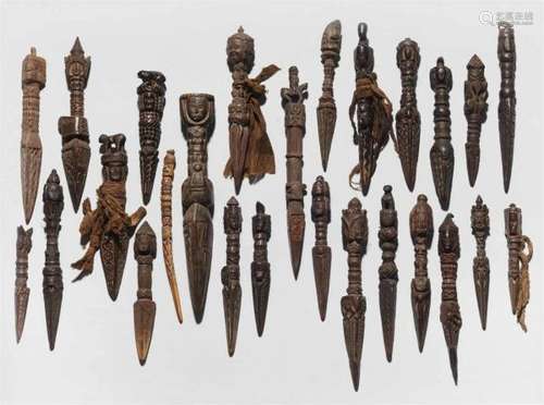 An interesting collection of 26 Nepalese wooden and stag antler phurbu25 phurbu [...]