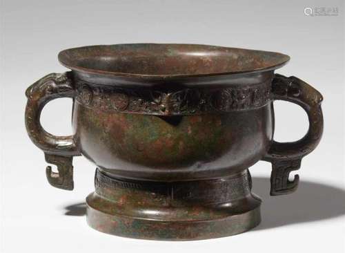 A bronze food vessel of gui type. Early Western Zhou dynasty, 11th century BCOn a [...]