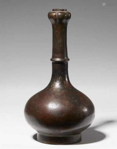 A bronze garlic-head wine vessel of hu type. Late Eastern Zhou dynasty, 4th/3rd [...]