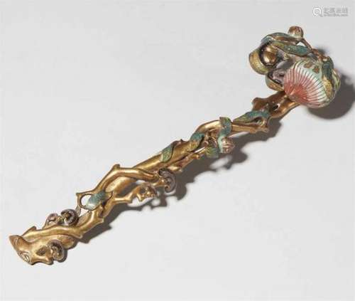 A bronze and champlevé enamel ruyi sceptre. 18th/19th centuryIn shape of two [...]