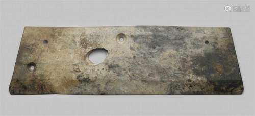 A black and light grey mottled jade ceremonial blade (hu). Western Zhou dynastyOf [...]