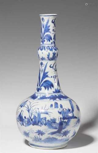 A blue and white bottle vase. Chongzhen period (1628-1644)Globular body with a tall [...]