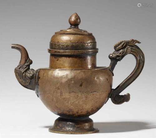 A Tibetan brass tea vesselThe handle in the form of a dragon and the spout [...]