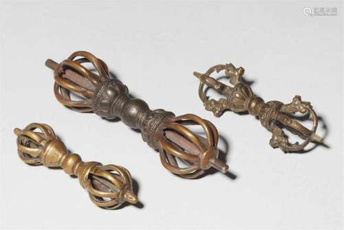 Three Tibetan bronze vajraTwo eight-pronged and one four-pronged vajra, the central [...]