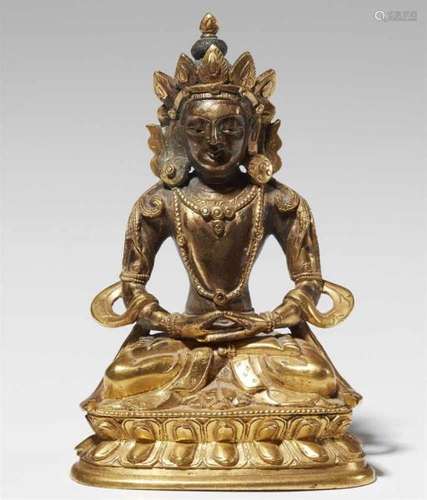 A Tibeto-Chinese gilt bronze figure of Buddha Amitayus. 18th century.The richly [...]