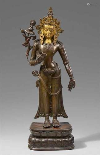 A Tibetan bronze figure of a bodhisattva. 19th centuryStanding on a rectangular lotus [...]