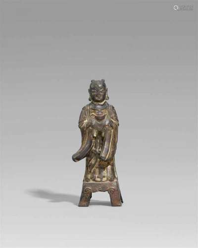 A bronze figure of Longnü. Ming dynastyStanding in elegant robes on a four-legged [...]