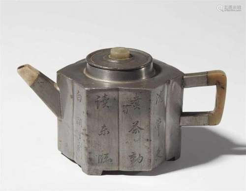 A pewter Yixing teapot. 19th centuryOf hexagonal shape, the spout, part of the handle [...]