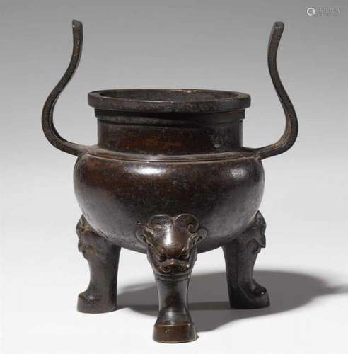 A bronze incense burner. Ming dynastyIn the style of an archaic ding with a globular [...]