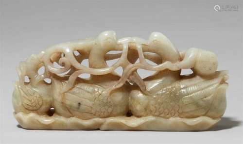 A greyish-green jade group of three ducks. 19th/20th centuryCarved as two adults [...]