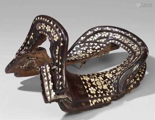 A lacquered wood saddle. Probably early Qing dynastyPommel and cantle inserted into [...]