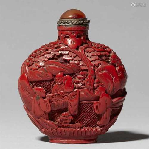 A carved red lacquer snuff bottle. 19th centuryA red lacquer snuff bottle carved with [...]