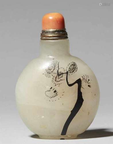 A glass snuff bottle. 19th centuryIn imitation of jade with stylised chrysanthemum in ink.