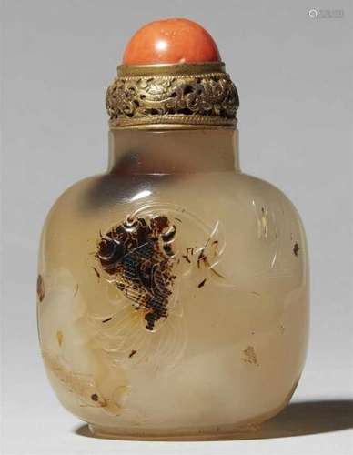 An agate snuff bottle. 19th/20th centuryA shadow agate snuff bottle carved in low [...]