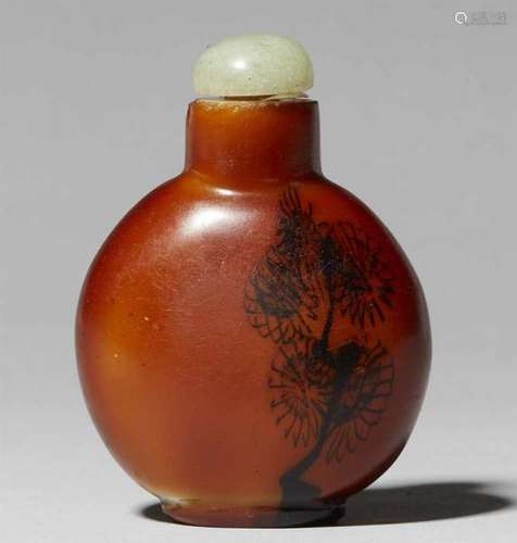 A glass snuff bottle. 19th/20th centuryOf bulbous form, in imitation of brown agate, [...]