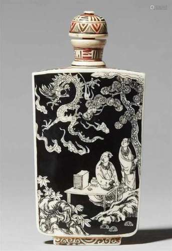 An ivory snuff bottle. Japan. Early 20th centuryWith black line drawings of figures [...]