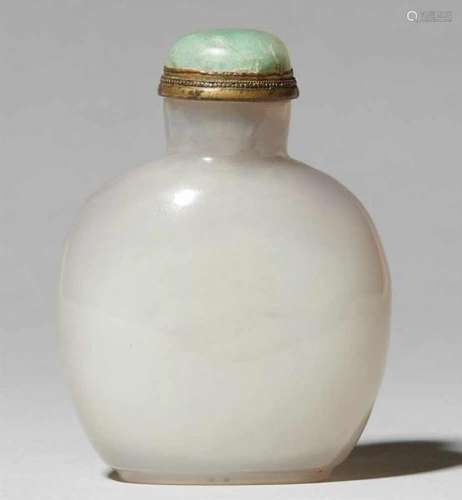 A glass snuff bottleOf almost round shape, in imitation of calzedon. Stopper. Height 6.2